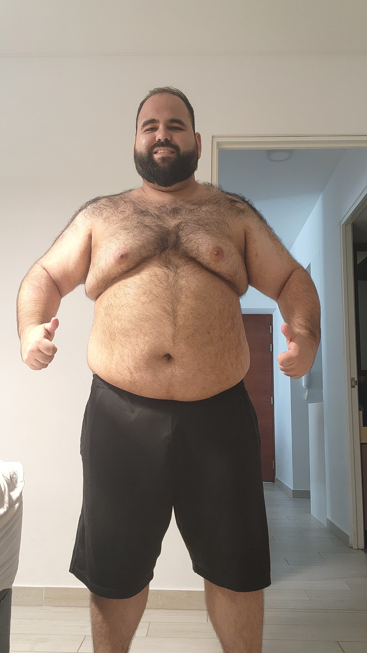 Renzo flexing with a smile — March 2024